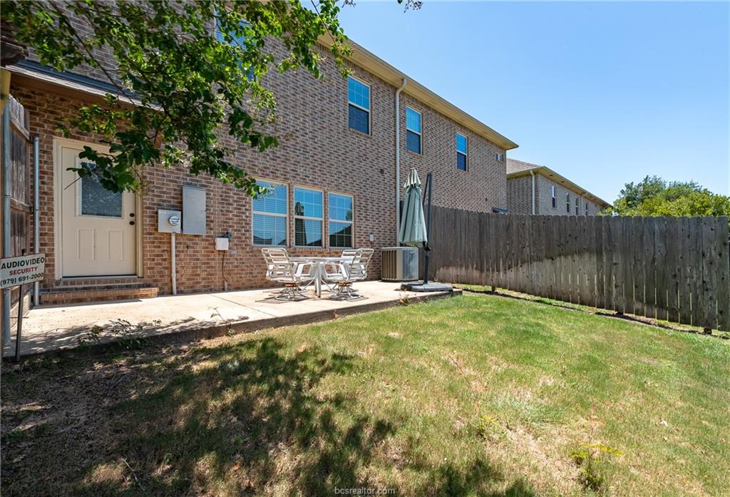 1408 Cres Ridge Drive College Station, TX 77845 - Photo 17 of 19 a view of a house with backyard and trees