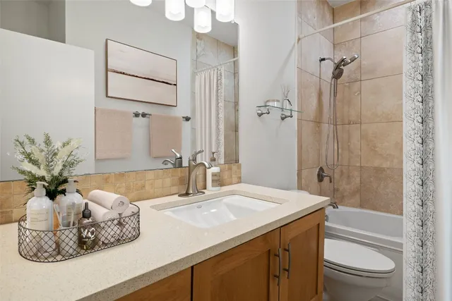 a bedroom with a large bed and a large window