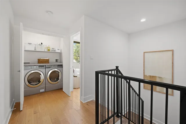 a bathroom with a granite countertop sink a toilet and bathtub