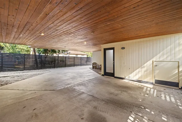 a bedroom with bed and window