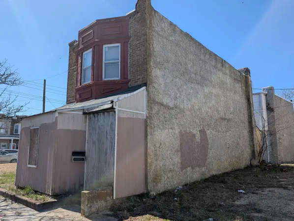 a brick building with a large window