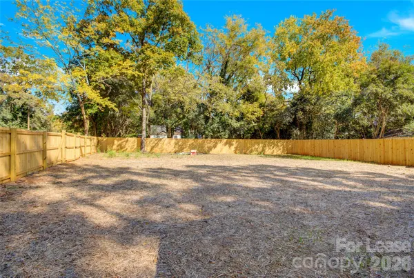 a view of yard with trees