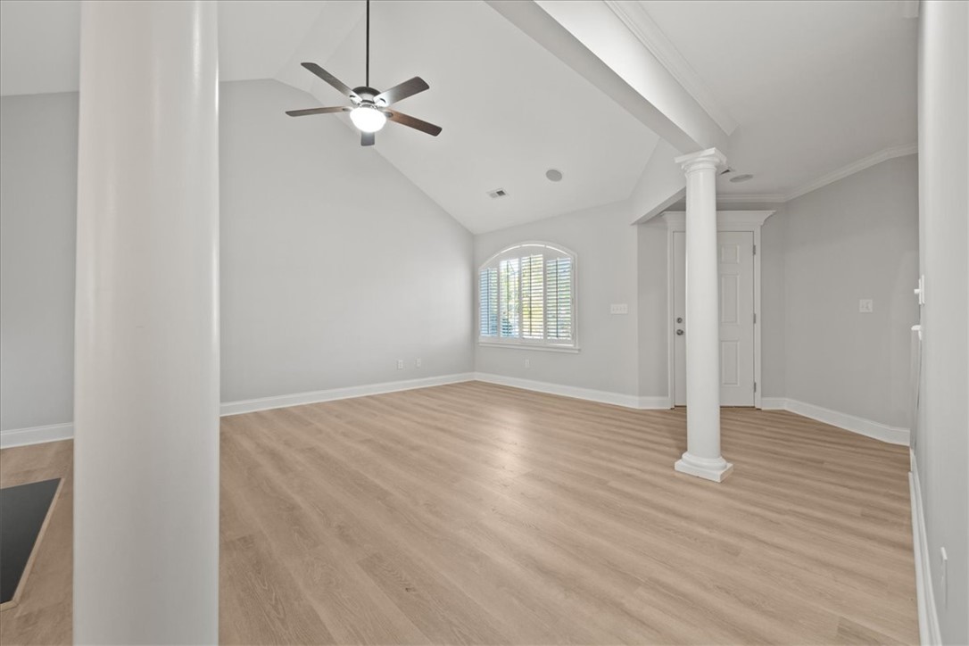100 Shipyard Circle Anderson, SC 29621 - Photo 4 of 40 This airy space features luxury vinyl plank flooring, elegant columns, and ample natural light.