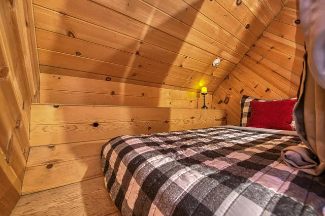 a living room with a couch and a flat screen tv