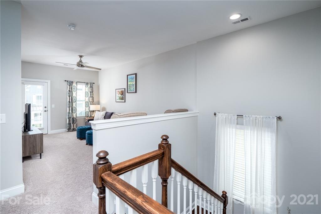 240 Helton Lane Fort Mill, SC 29708 - Photo 22 of 36 a view of a livingroom with furniture and staircase