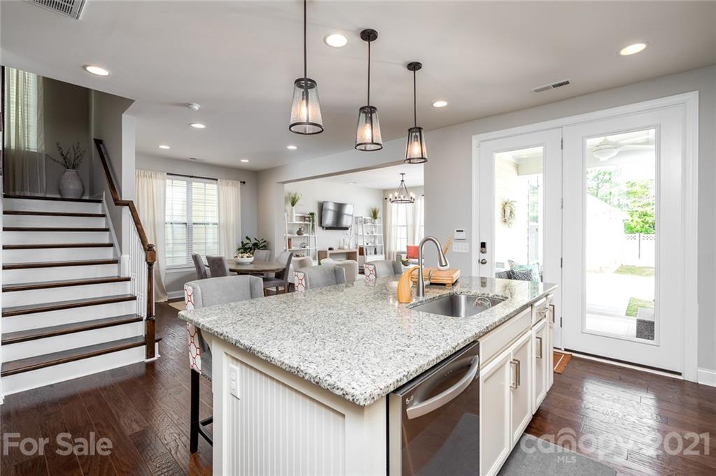 240 Helton Lane Fort Mill, SC 29708 - Photo 7 of 36 a large kitchen with kitchen island a large island in it