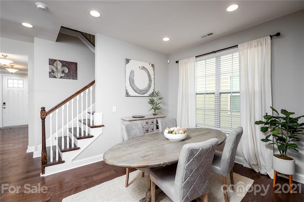 240 Helton Lane Fort Mill, SC 29708 - Photo 8 of 36 a view of a dining room with furniture window and wooden floor