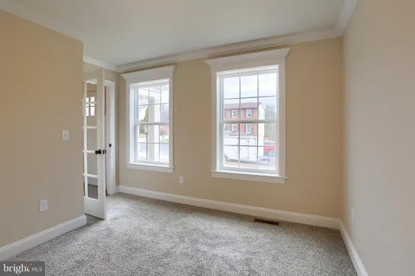a view of livingroom with hardwood floor and window