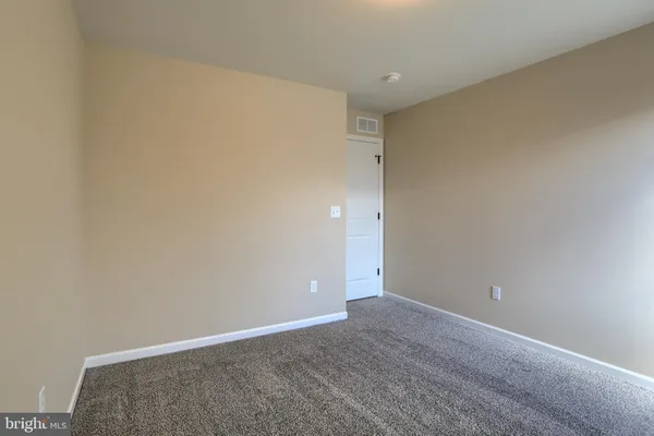 a front view of a house with a balcony