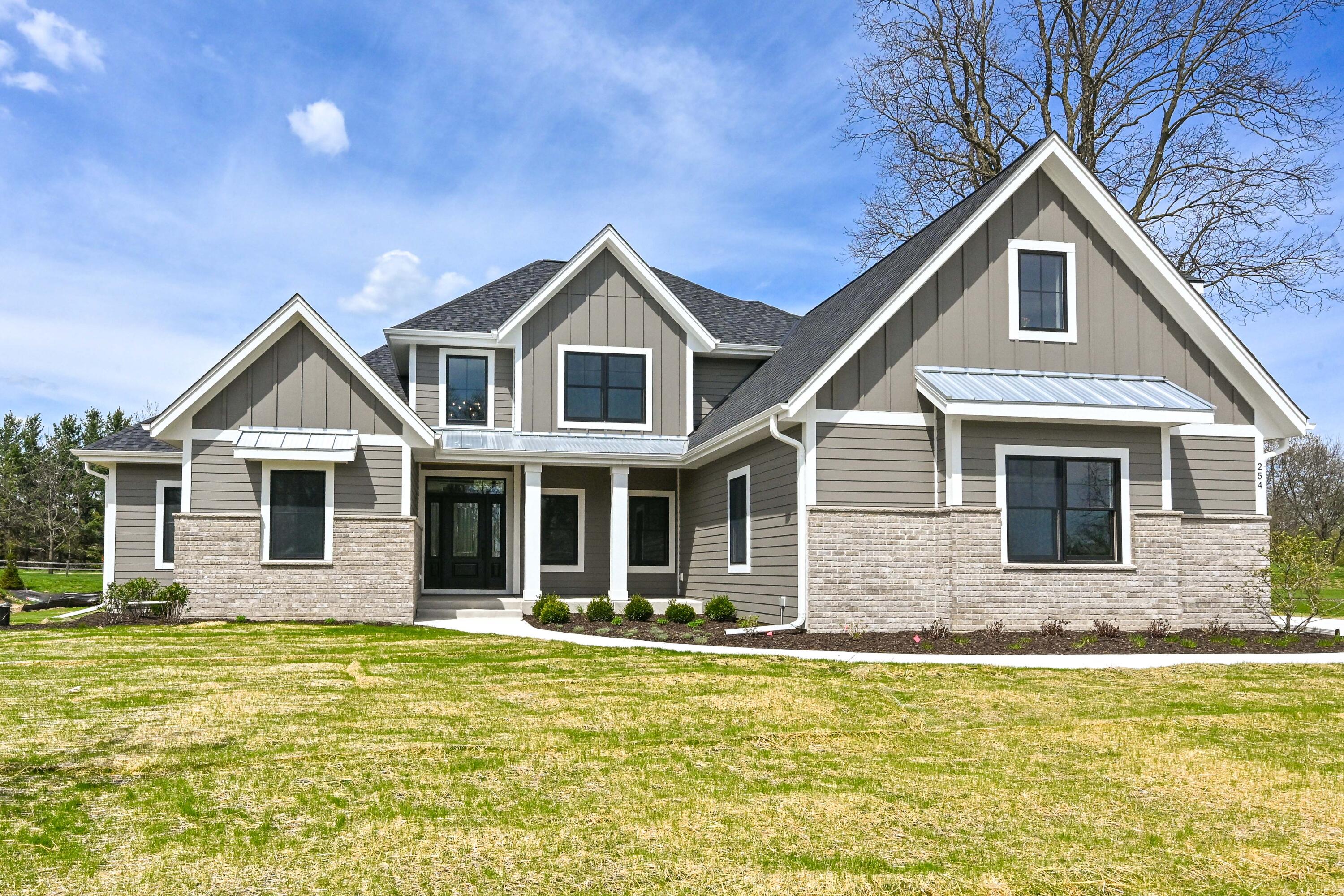 254 River Oaks Circle Delafield, WI 53018 - Photo 1 of 47 DZ254-2