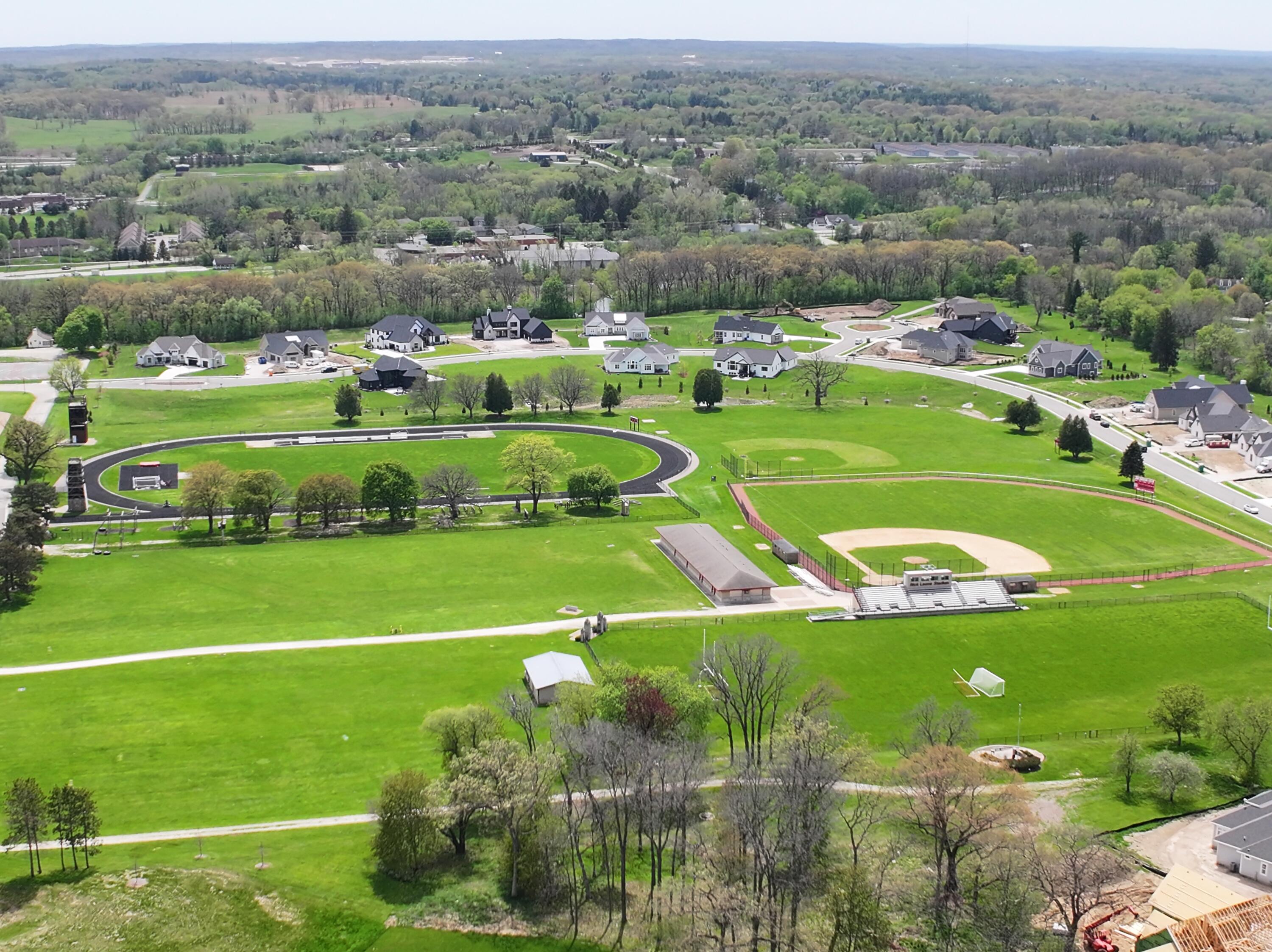 254 River Oaks Circle Delafield, WI 53018 - Photo 43 of 47 DJI_20260504101424_0033_D