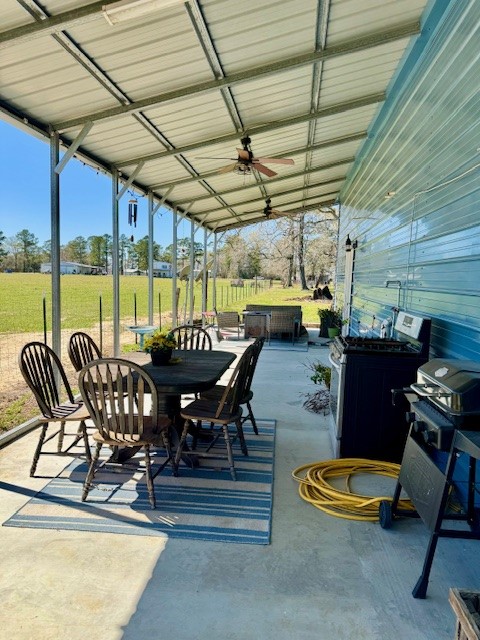59 Private Road Dayton, TX 77535 - Photo 13 of 13 a view of a swimming pool with a dining table and chairs