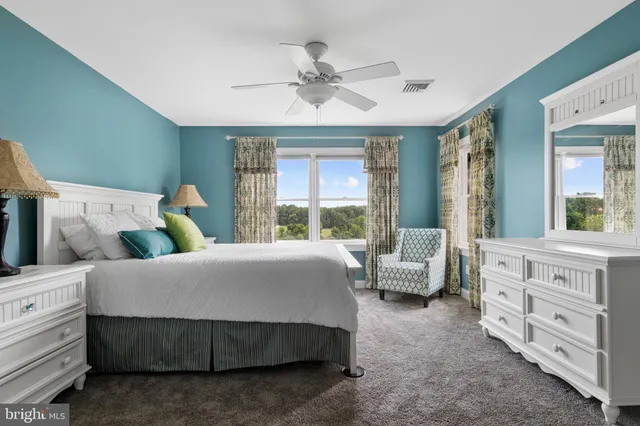 a kitchen with stainless steel appliances granite countertop a stove and cabinets