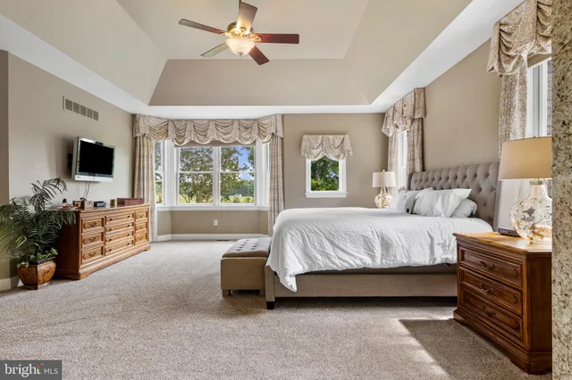 a kitchen with stainless steel appliances granite countertop a stove and a refrigerator