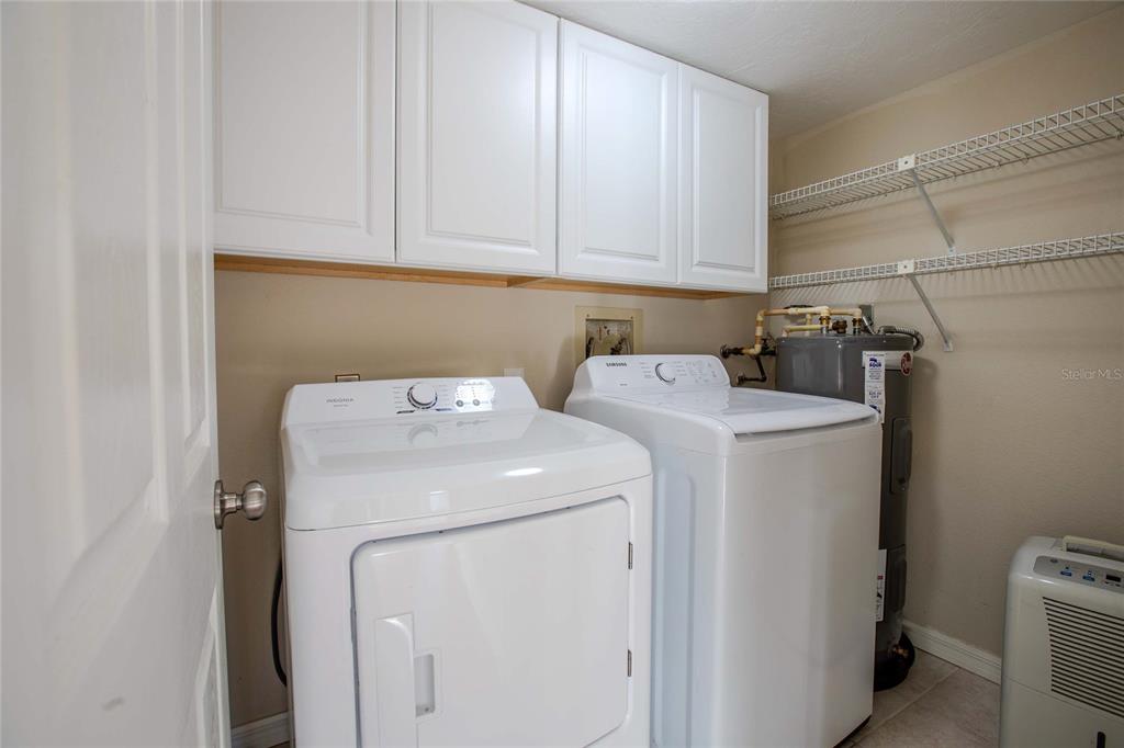 3300 South Beneva Road, Unit 214 Sarasota, FL 34232 - Photo 16 of 22 a utility room with dryer and washer