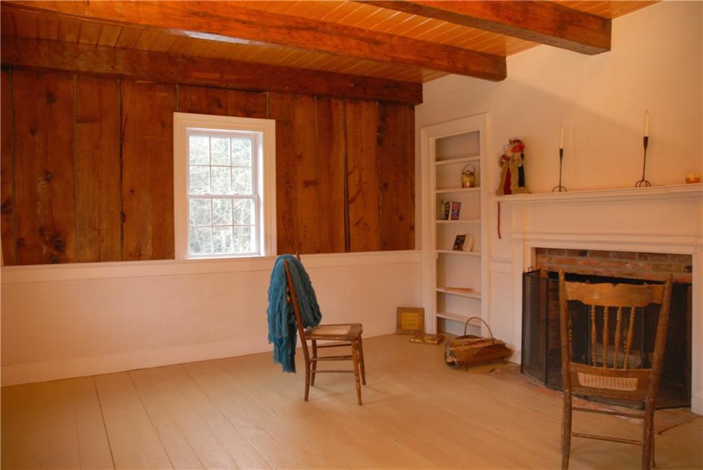 109 Lewis Hill Road Newcastle, ME 04553 - Photo 12 of 24 Historica front parlor: Plank walls,...