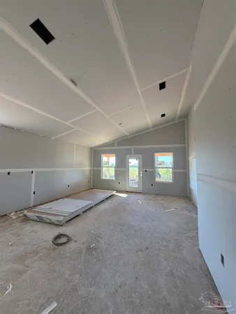 a view of a small space with racks on the wall
