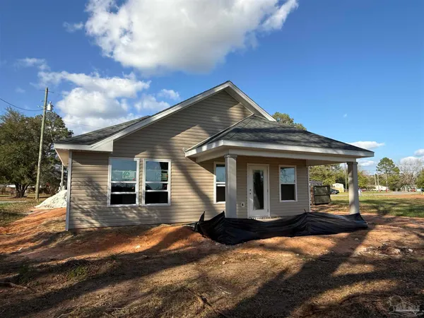 a view of a hallway with wooden walls and stairs