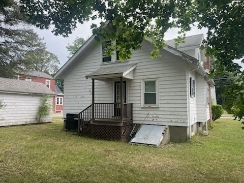 15 Howard Street Wakefield, MA 01880 - Photo 3 of 23 a view of a house with a backyard