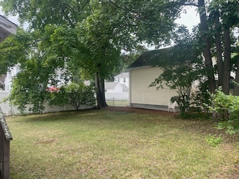 15 Howard Street Wakefield, MA 01880 - Photo 5 of 23 a view of a yard with a tree