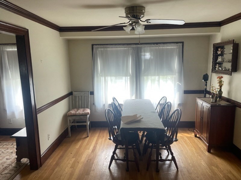 15 Howard Street Wakefield, MA 01880 - Photo 8 of 23 a view of a dining room with furniture window and wooden floor