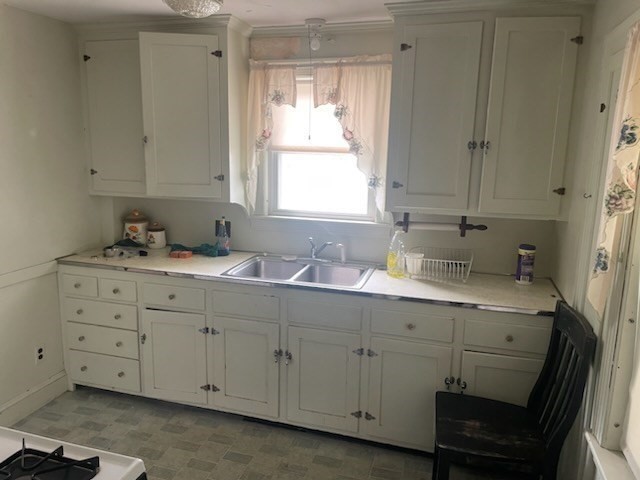 15 Howard Street Wakefield, MA 01880 - Photo 10 of 23 a bathroom with a sink and a window