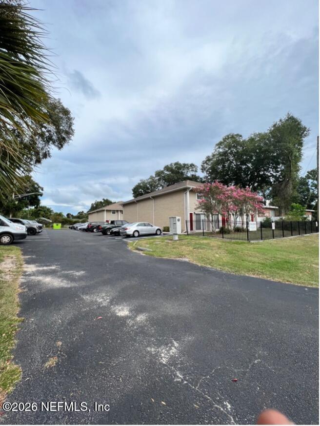 a view of a house with a big yard