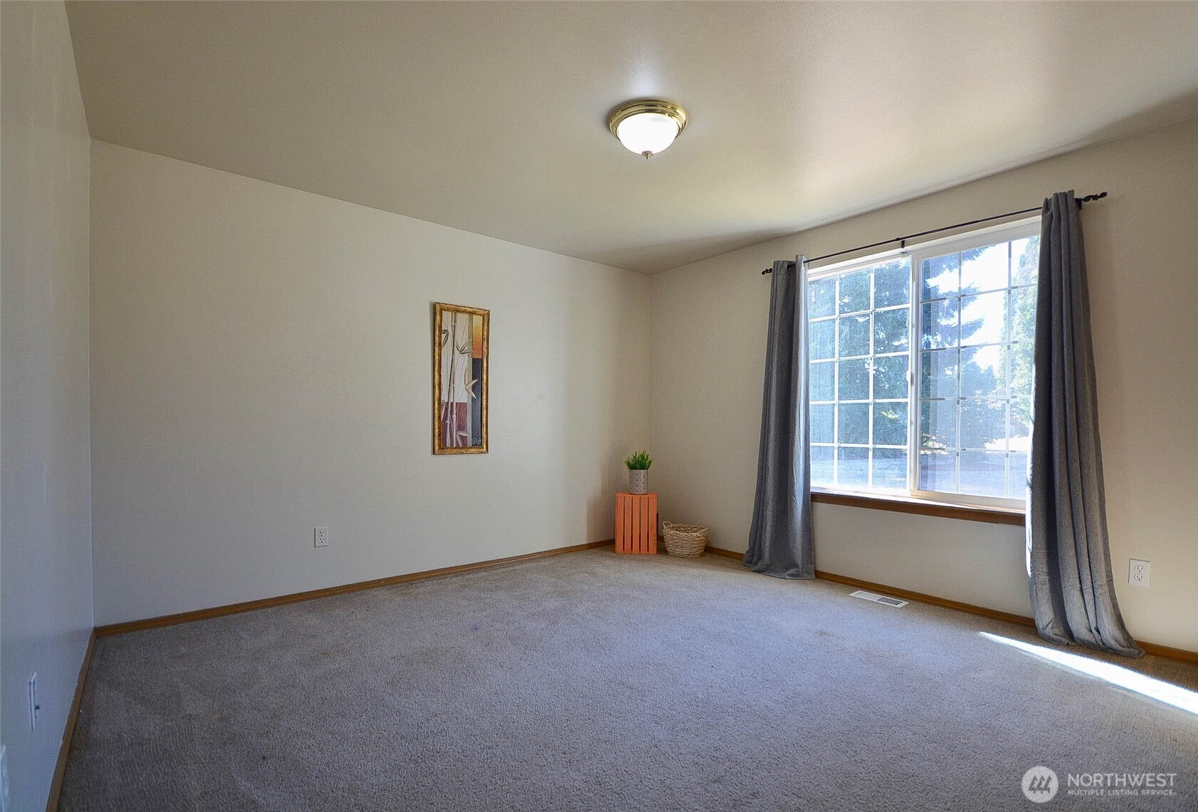 14638 Lawrence Lake Road Southeast Yelm, WA 98597 - Photo 17 of 38 an empty room with windows