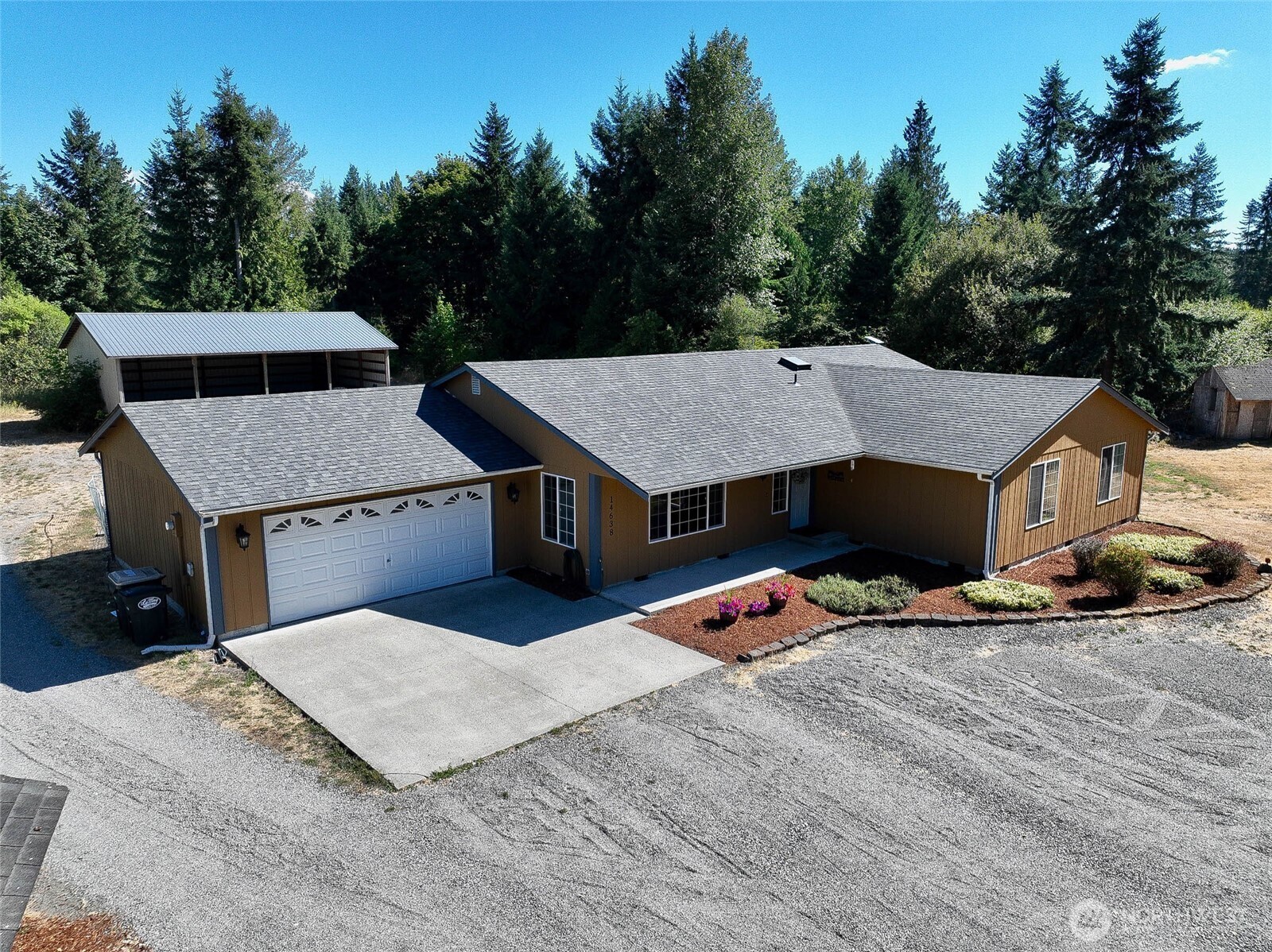 14638 Lawrence Lake Road Southeast Yelm, WA 98597 - Photo 22 of 38 an aerial view of a house roof deck