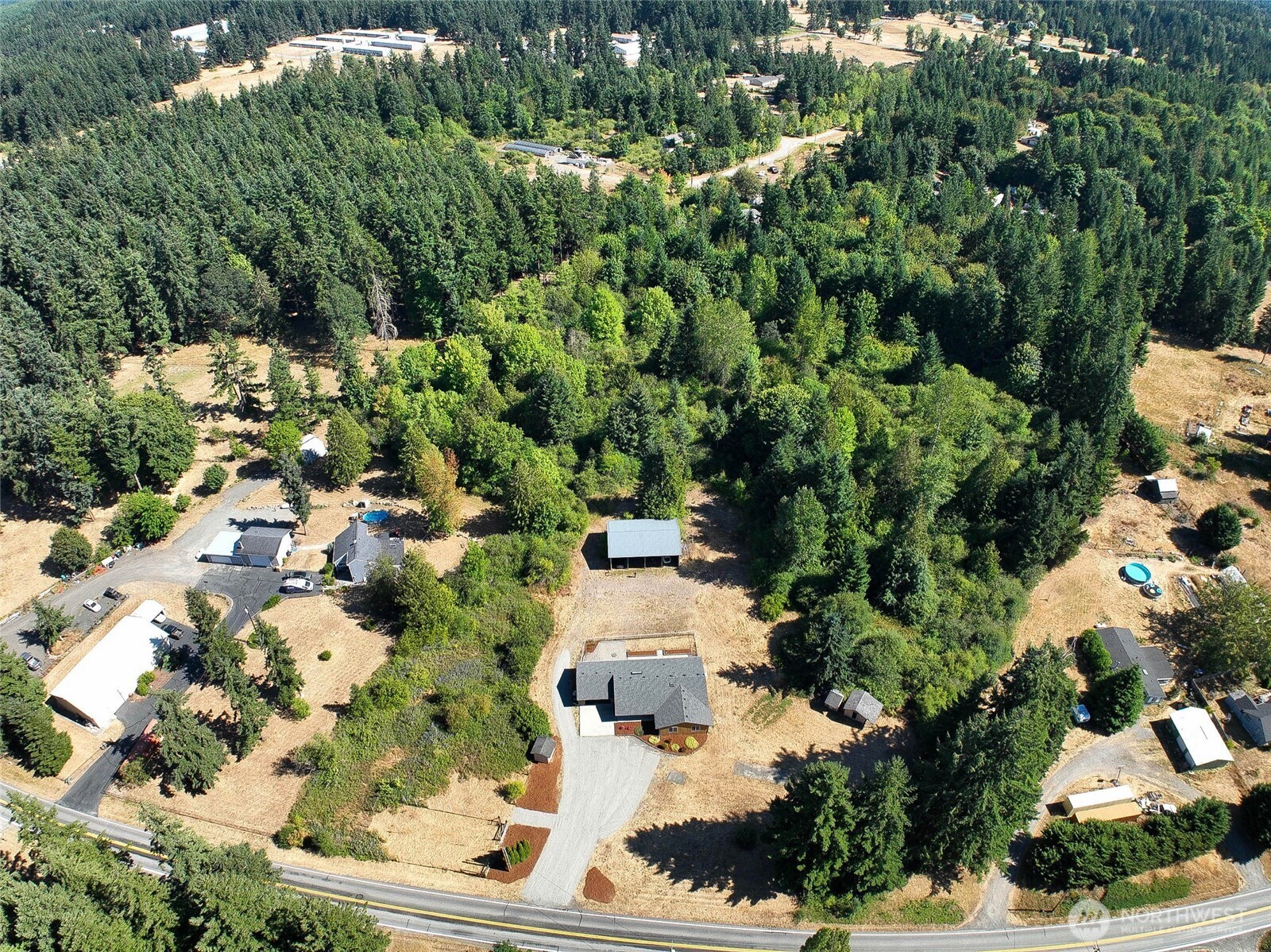 14638 Lawrence Lake Road Southeast Yelm, WA 98597 - Photo 36 of 38 an aerial view of a residential houses with yard