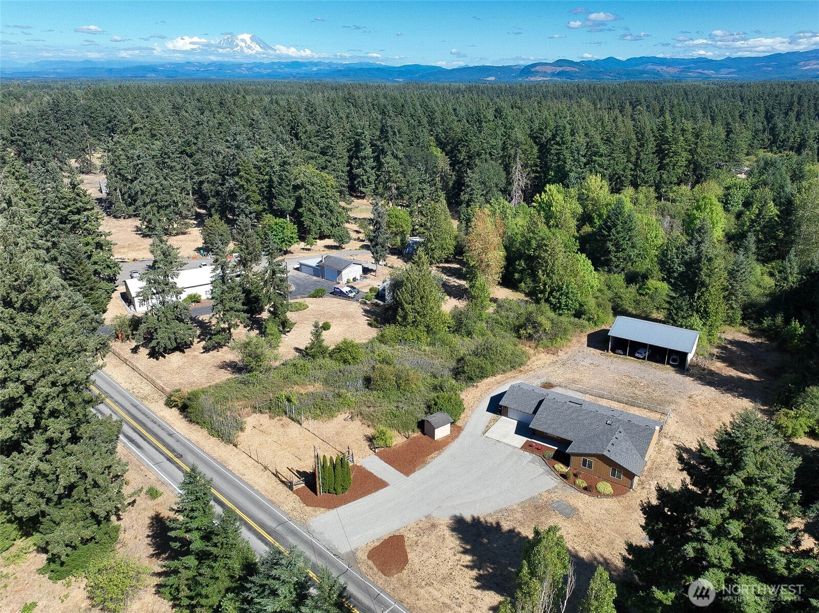 14638 Lawrence Lake Road Southeast Yelm, WA 98597 - Photo 38 of 38 an aerial view of a house with a yard