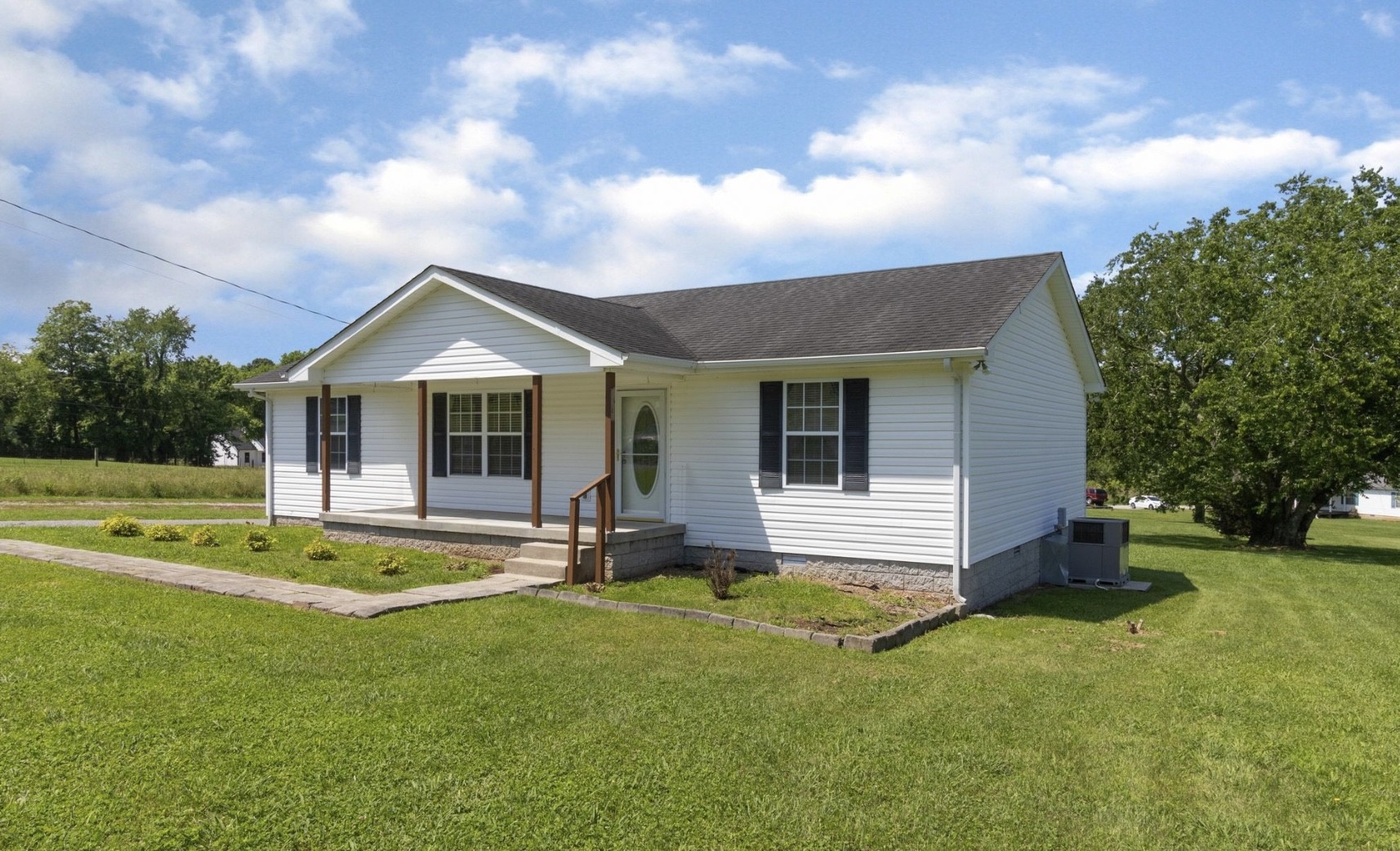 194 Opossum Hollow Road Watertown, TN 37184 - Photo 4 of 7 a front view of house with yard and green space
