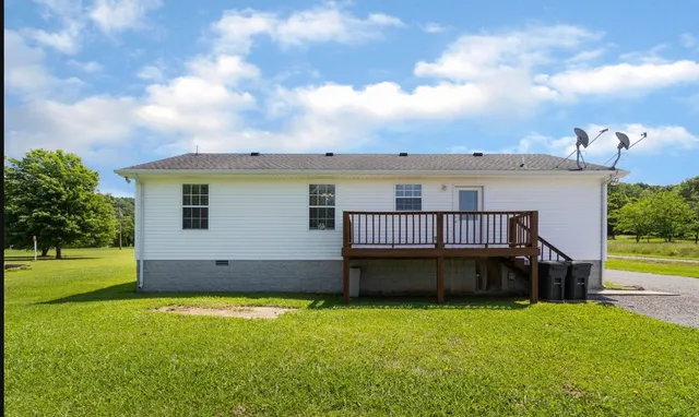 a view of a house with a roof deck