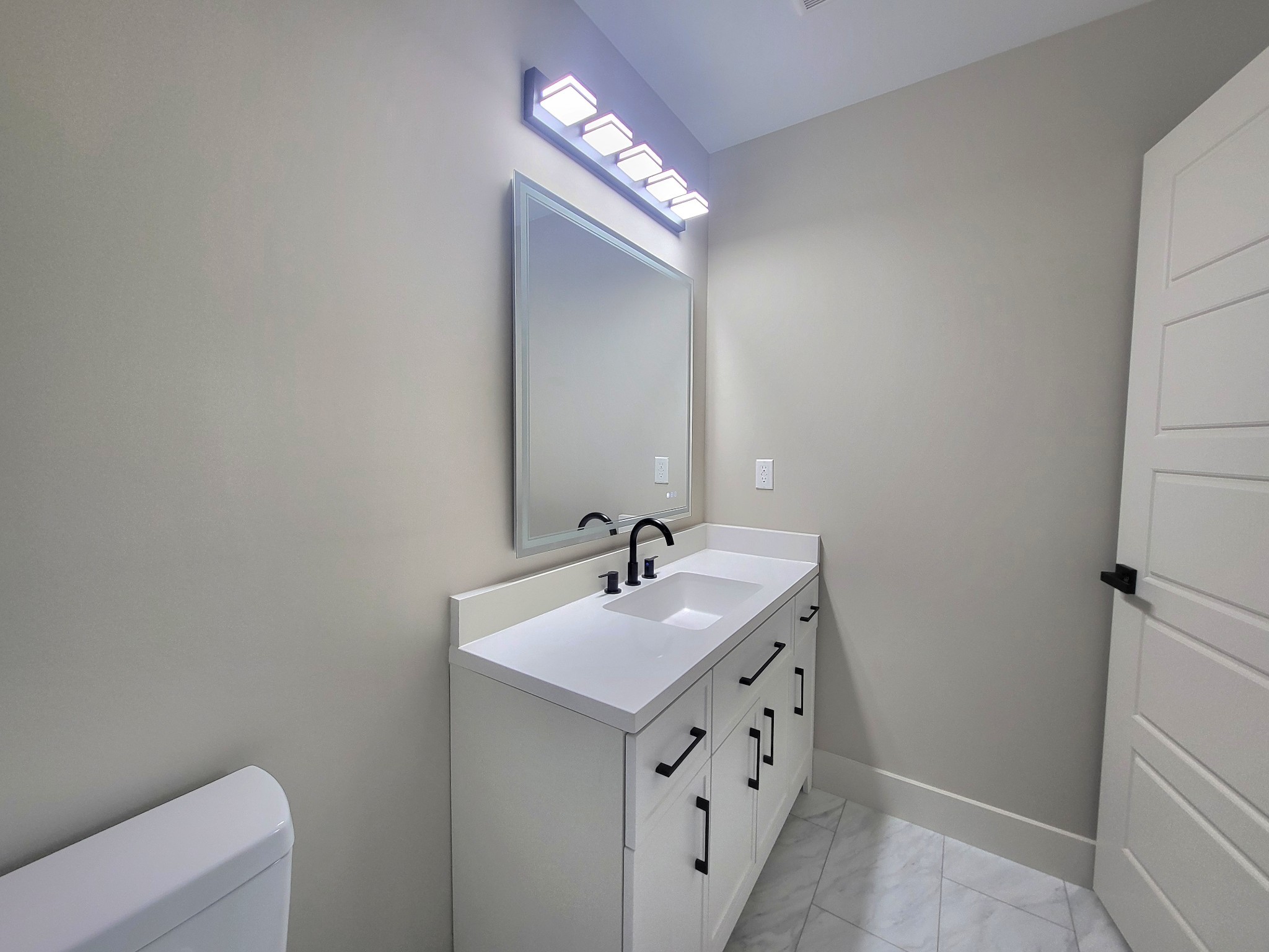 23 Cable Road, Unit A Oak Grove, KY 42262 - Photo 3 of 5 a bathroom with a sink and a mirror