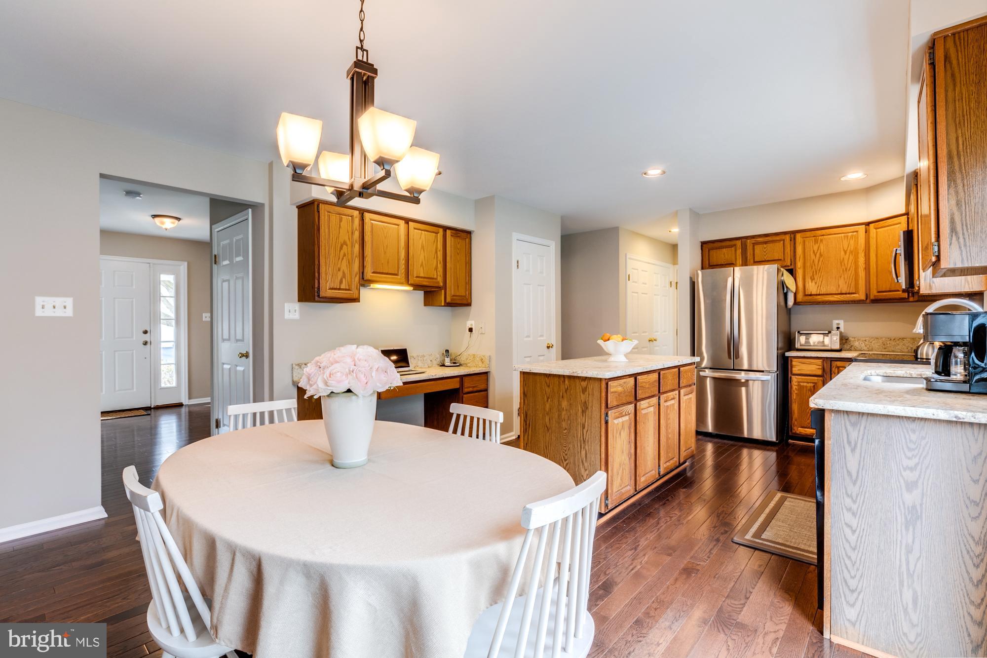 12553 Rock Ridge Road Herndon, VA 20170 - Photo 15 of 42 ESIK situated between kitchen and family room