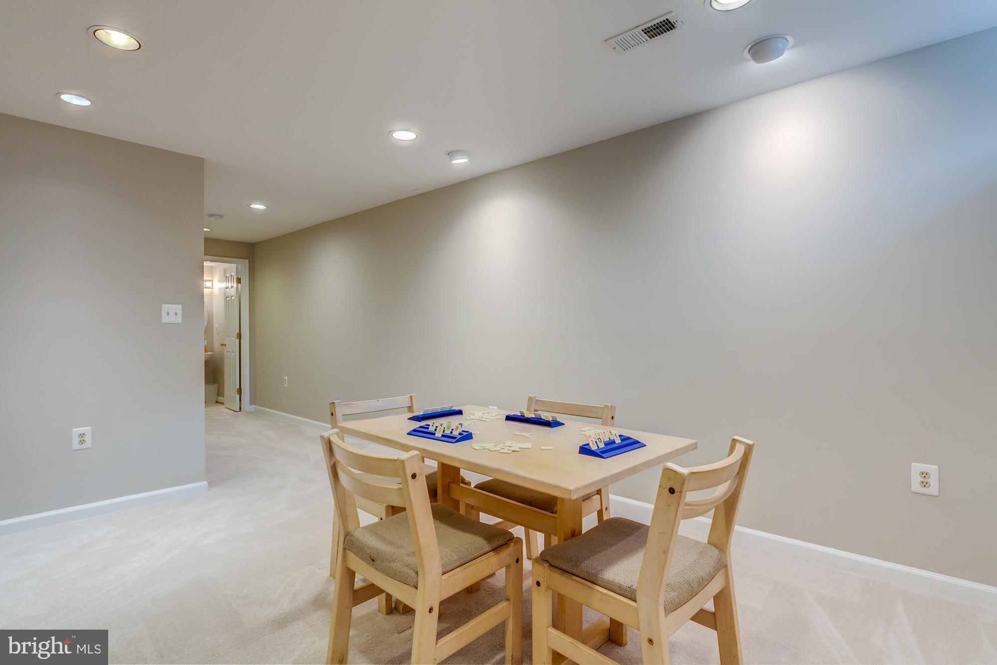 12553 Rock Ridge Road Herndon, VA 20170 - Photo 36 of 42 Rec room leading to storage and full bath