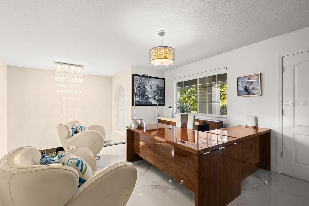 1349 Castleport Road Winter Garden, FL 34787 - Photo 25 of 40 a living room with furniture and a large window
