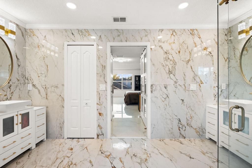 1349 Castleport Road Winter Garden, FL 34787 - Photo 31 of 40 a bathroom with a shower and a sink