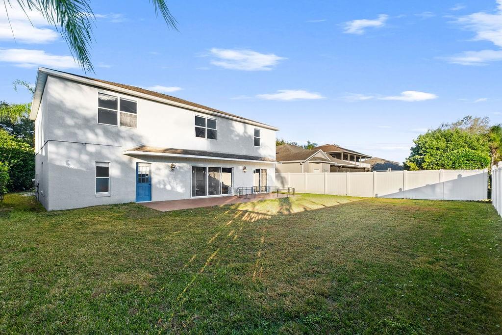 1349 Castleport Road Winter Garden, FL 34787 - Photo 38 of 40 a view of a house with pool and chairs