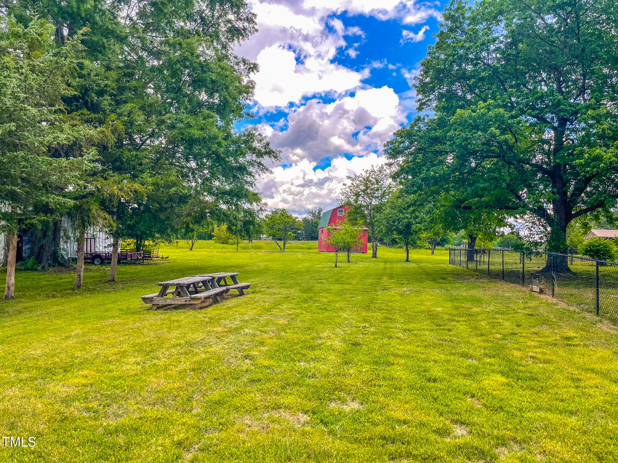 623 Chambers Road Rougemont, NC 27572 - Photo 15 of 44 a view of a playground with basketball court