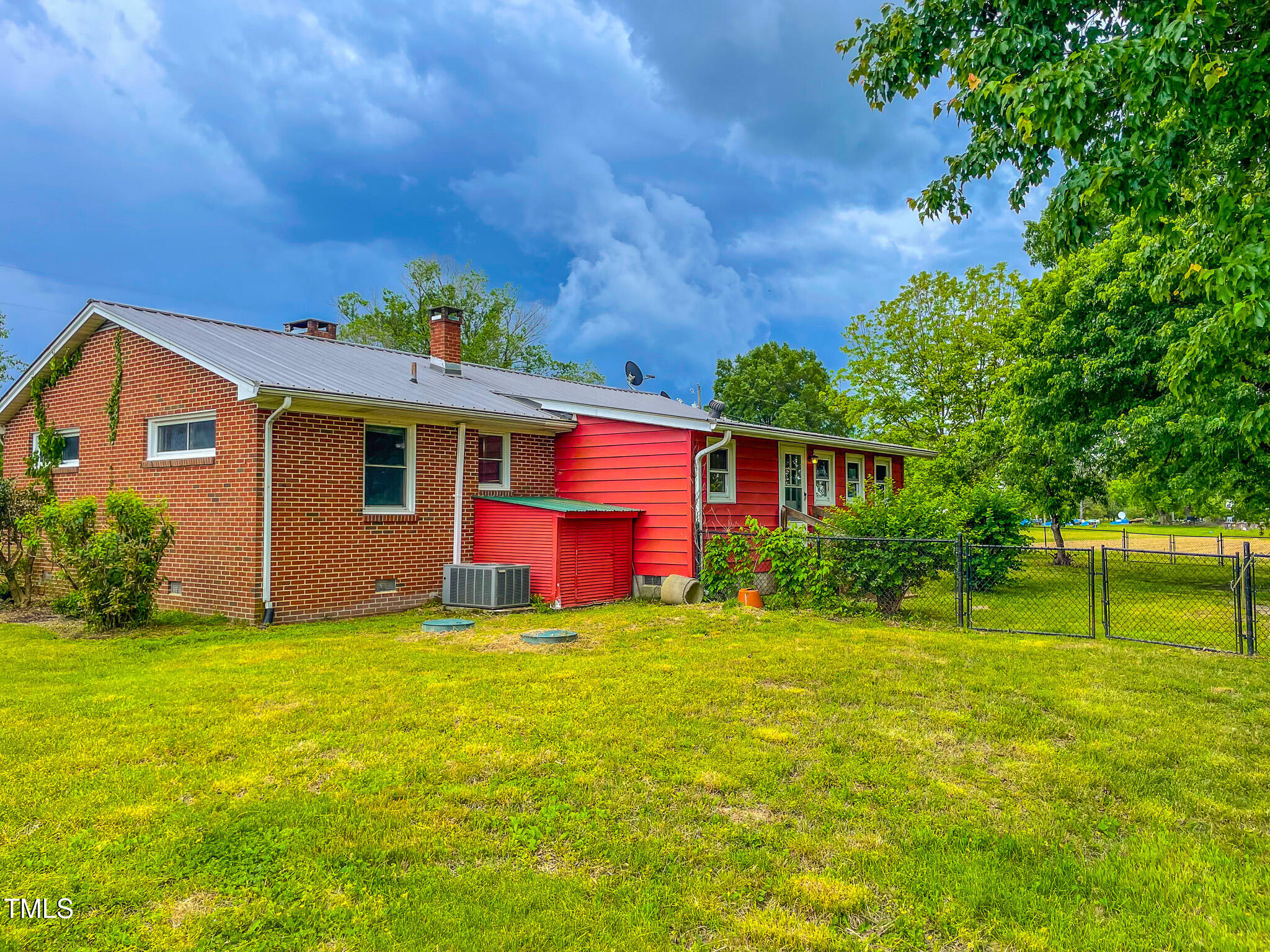 623 Chambers Road Rougemont, NC 27572 - Photo 17 of 44 a view of a house with a yard
