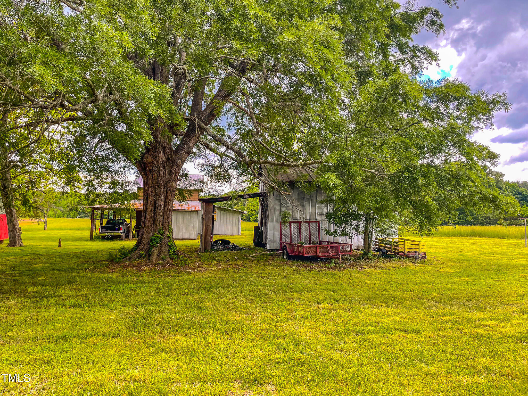 623 Chambers Road Rougemont, NC 27572 - Photo 21 of 44 a swimming pool with trees in front of it