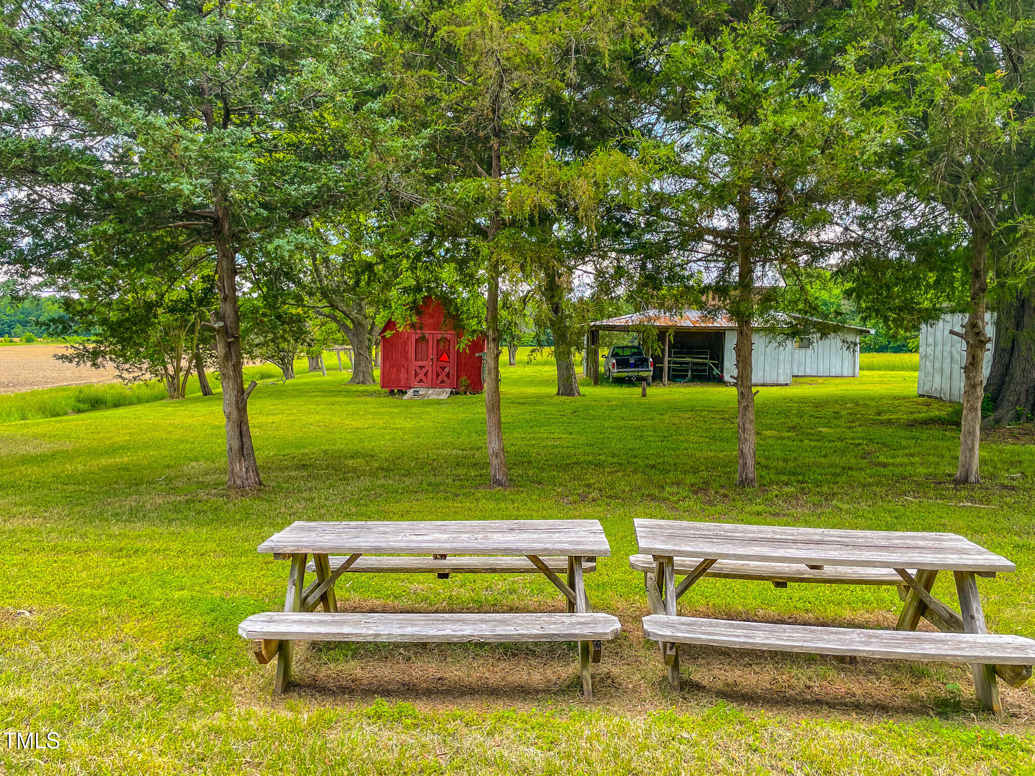 623 Chambers Road Rougemont, NC 27572 - Photo 22 of 44 a view of an house with swimming pool and yard