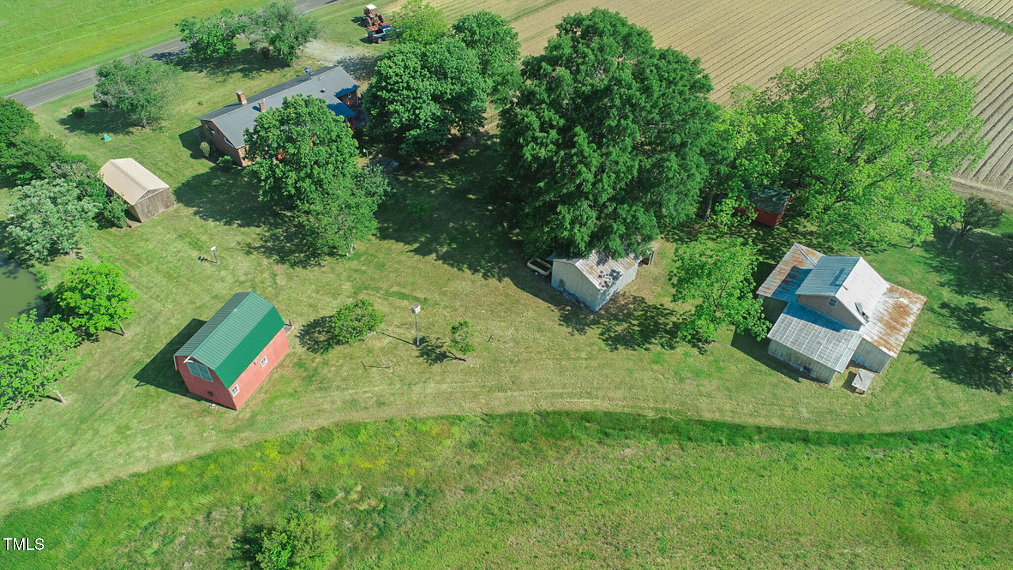 623 Chambers Road Rougemont, NC 27572 - Photo 34 of 44 an aerial view of a house with a yard basket ball court and outdoor seating
