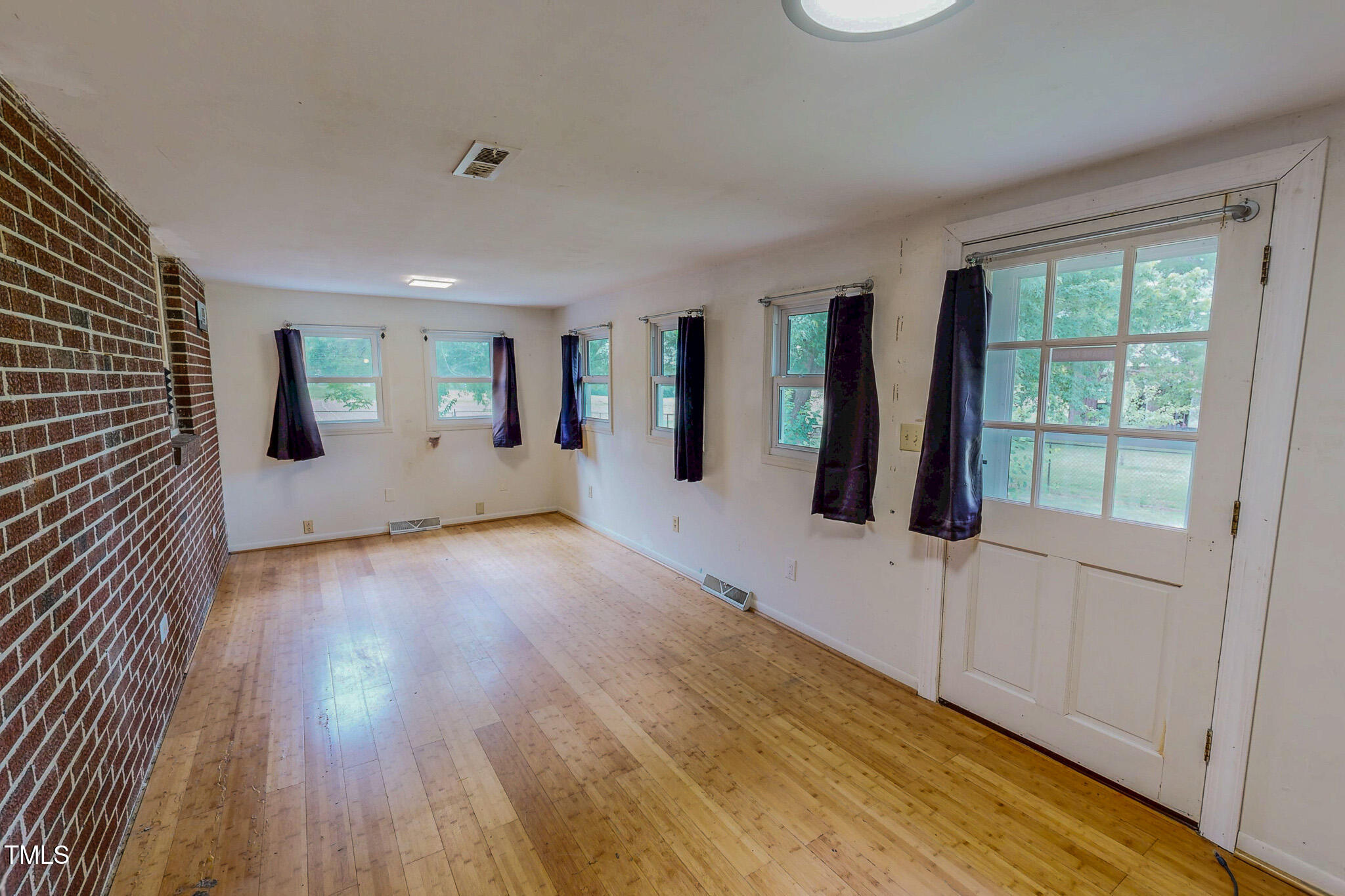 623 Chambers Road Rougemont, NC 27572 - Photo 4 of 44 wooden floor and windows in a room