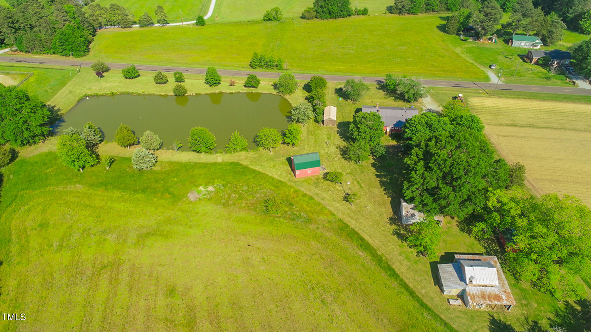 623 Chambers Road Rougemont, NC 27572 - Photo 7 of 44 a view of a swimming pool with a yard