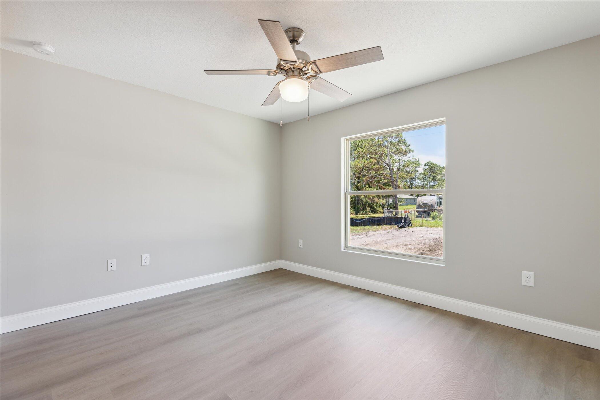 2414 Anchor Road Southeast Palm Bay, FL 32909 - Photo 8 of 25 12-2414-Anchor-Rd-SE-Palm-Bay-FL-32909-W