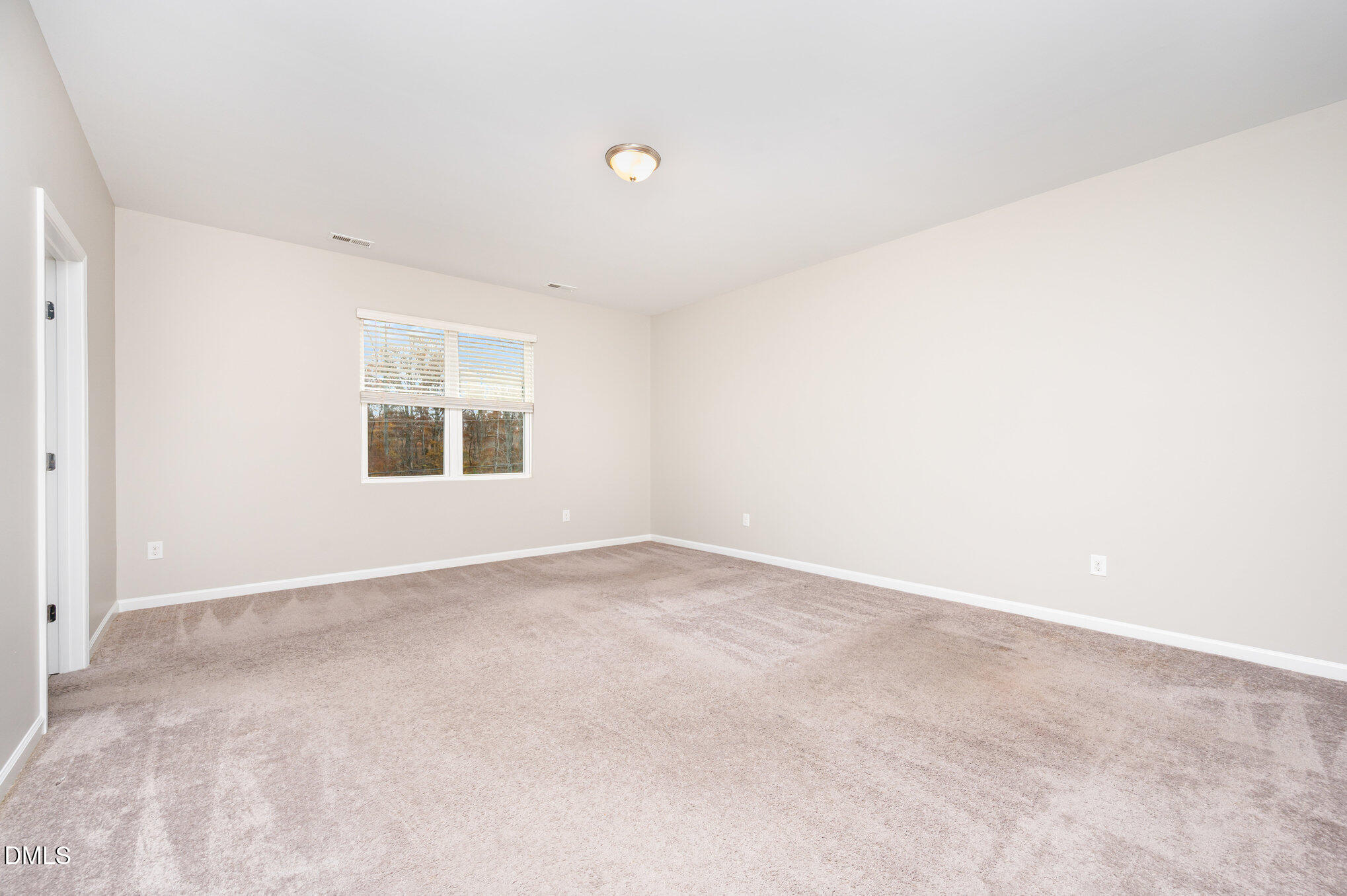 18 Dover Ridge Court Chapel Hill, NC 27517 - Photo 23 of 40 an empty room with a window