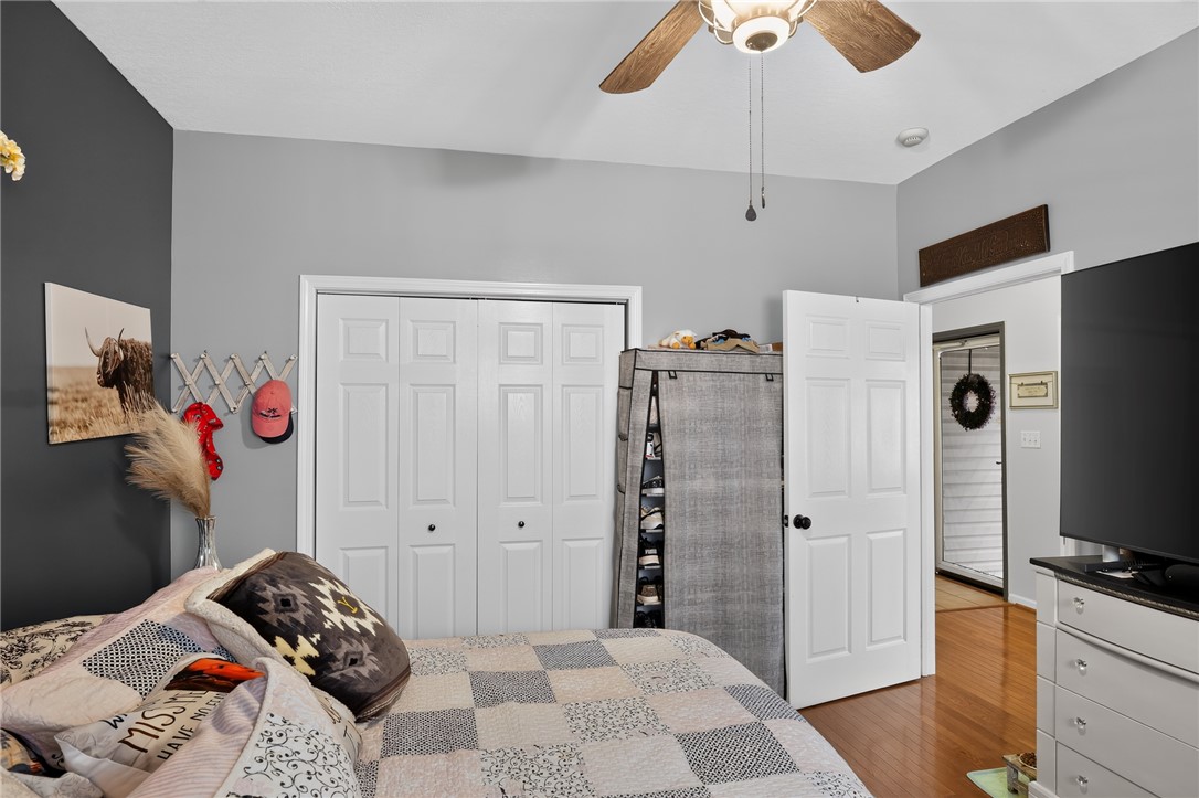 144 Elliott Circle Anderson, SC 29621 - Photo 17 of 30 Wood flooring and bi-fold closet doors offer both warmth and functionality in this cozy sleeping space.