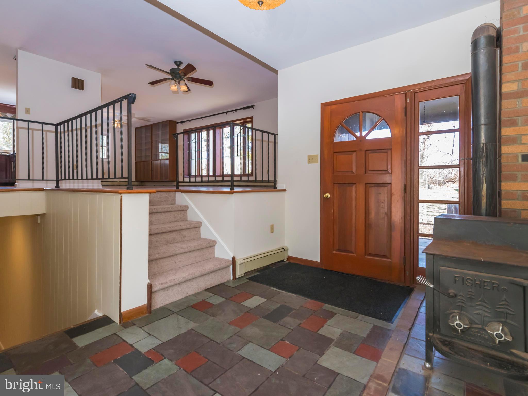 3050 Wonziegler Road Pennsburg, PA 18073 - Photo 3 of 31 Foyer with Wood stove